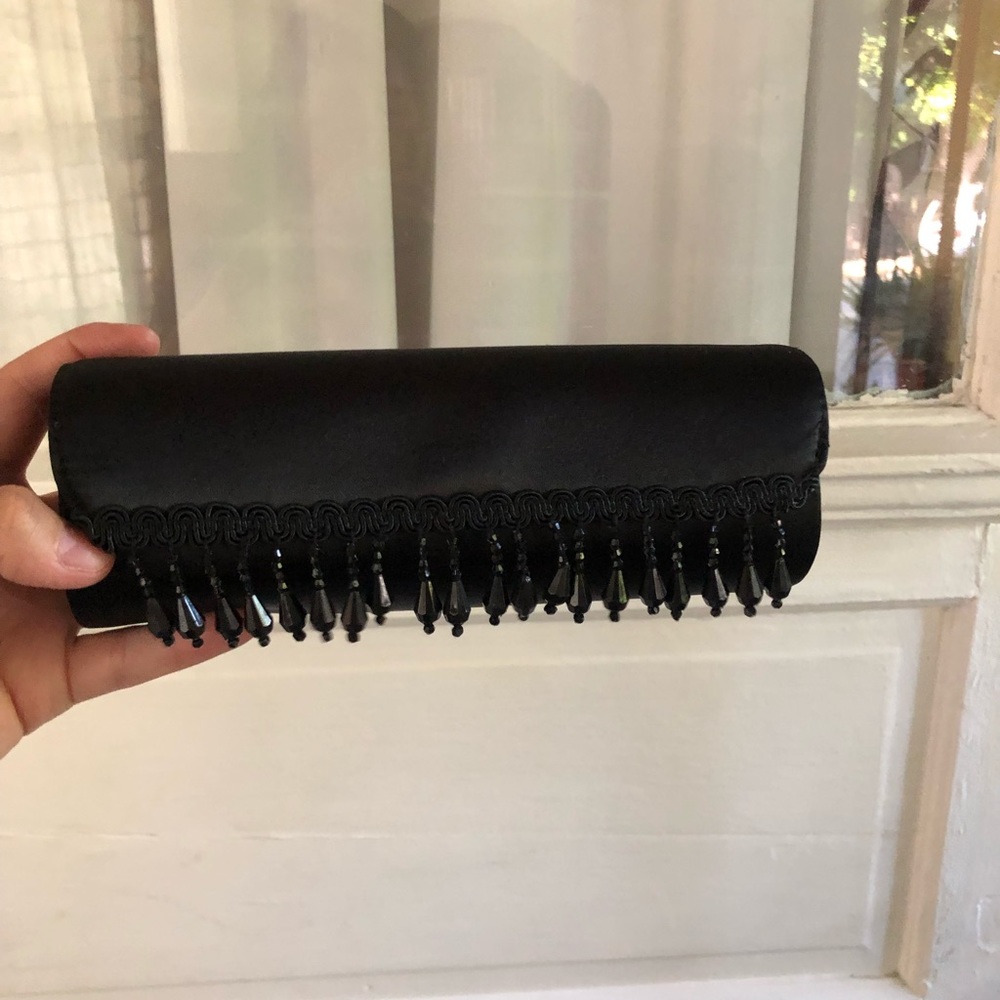 Black Mac makeup bag magnet closure